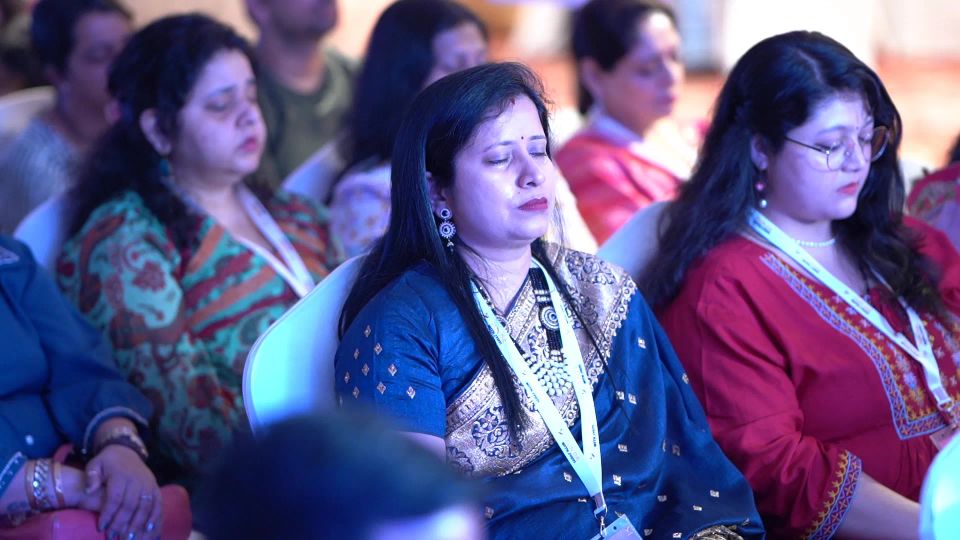 Women with eyes closed in a guided meditation